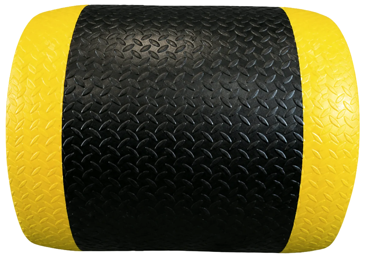 A full roll of Diamond Plate matting, black with yellow bevels down both long edges